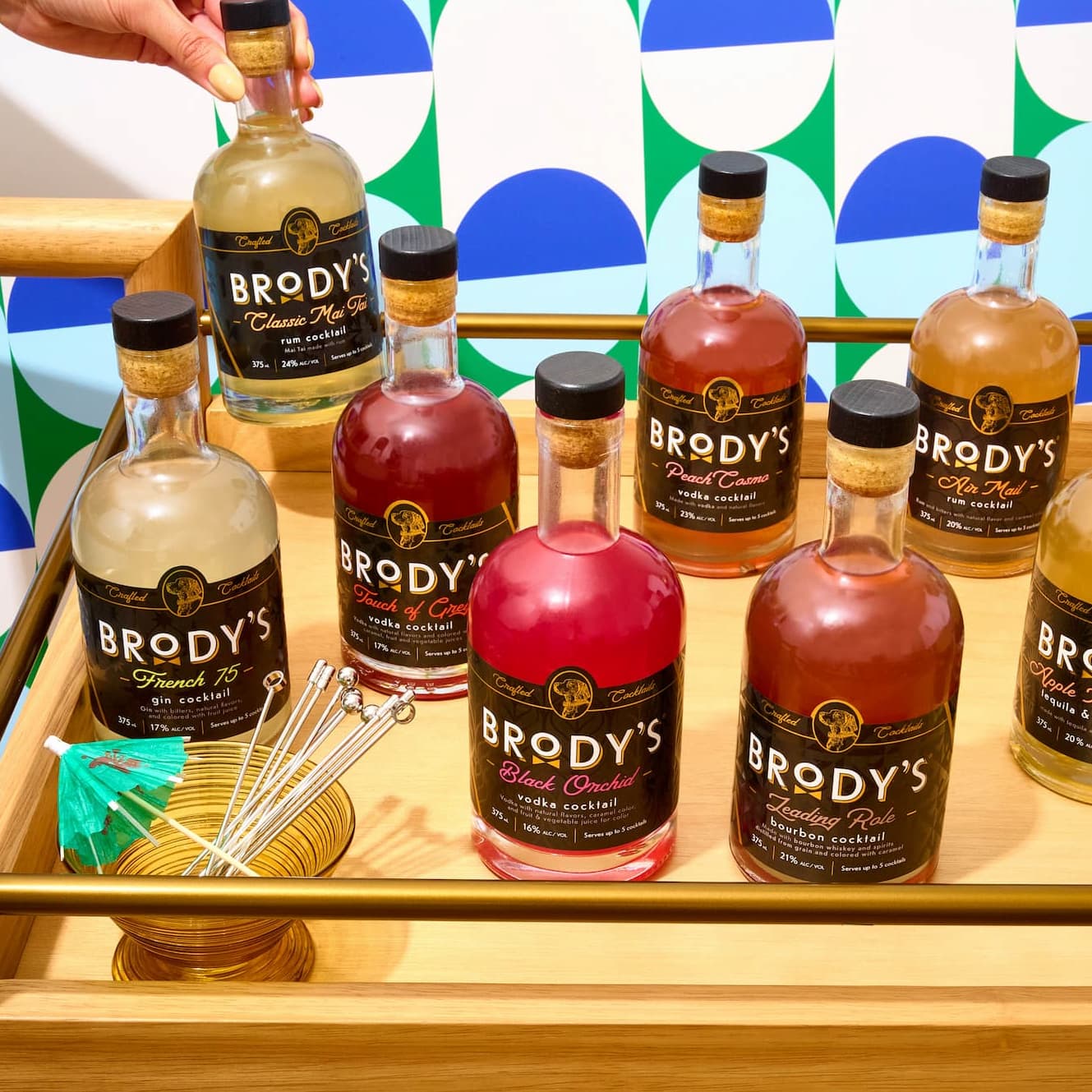 Brody's range of ready-to-serve craft cocktails displayed on a bar cart